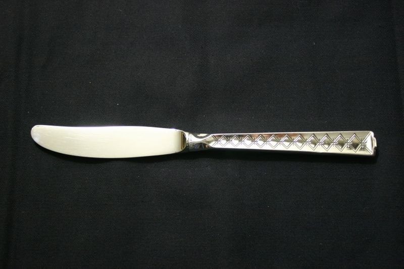 Tone liten spisekniv med langt skaft